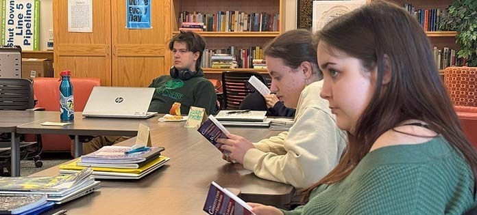 Image of Writers Studio students reading.